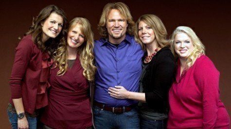 FILE - In this file publicity photo released by TLC on Nov. 22, 2010, Kody Brown, center, poses with his wives, from left,  Robyn, Christine, Meri and Janelle, in a promotional photo for the reality series, 