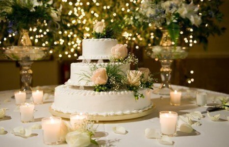 Wedding cake on the decorated table