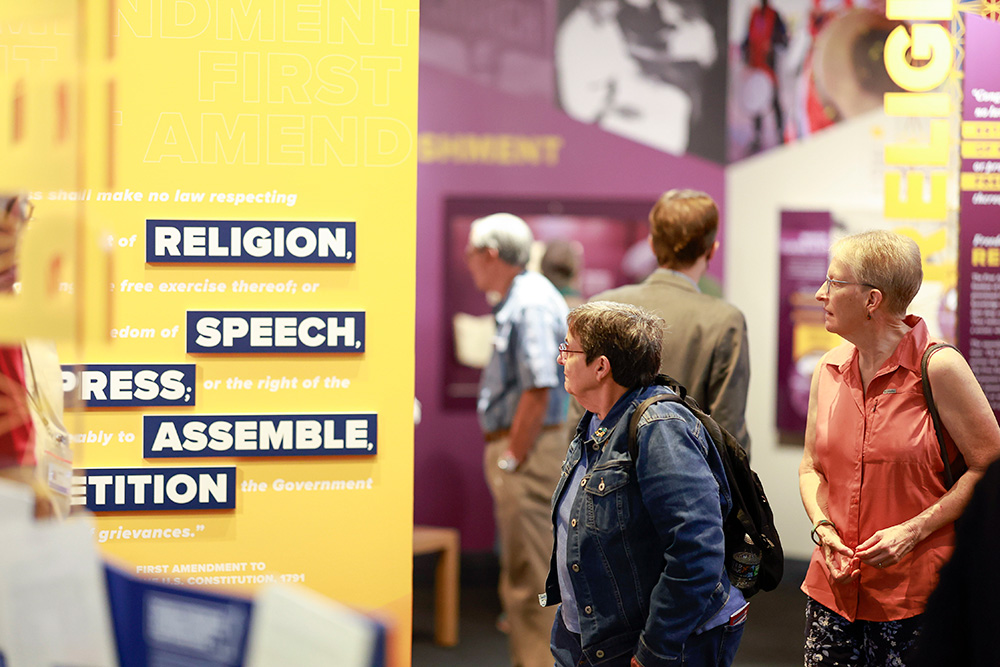 visitors in the First Amendment exhibit
