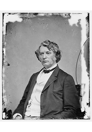 Glass negative in two pieces, assembled from upper left-hand corner to lower right-hand corner, of Charles Sumner, seated portrait, 1860.