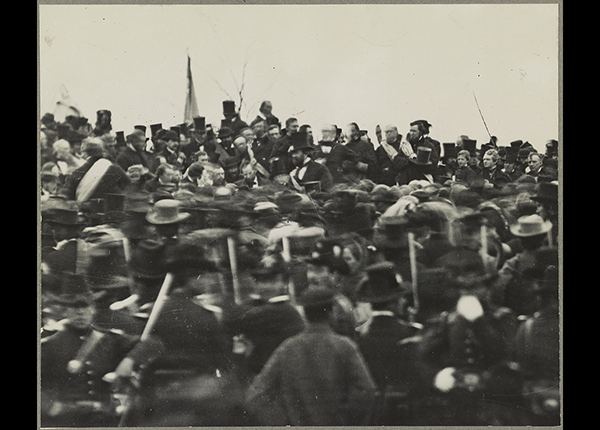 Reprint of a small detail of a black and white photo showing the crowd gathered for the dedication of the Soldiers' National Cemetery in Gettysburg, Penn., where President Abraham Lincoln gave his Gettysburg Address. Lincoln is visible facing the crowd, not wearing a hat.
