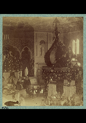Interior of St. Andrew's Hall, or Secession Hall, decorated with large wreaths and marble statues, photograph by George Cook, 1860.