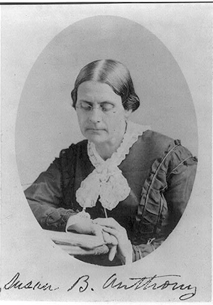 Susan B. Anthony, portrait seated at table, head-and-shoulders portrait in oval frame by Mathew Brady.