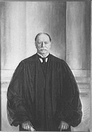 William Howard Taft standing in judicial robes, three-quarter portrait by Theodor Horydczak, 1950.